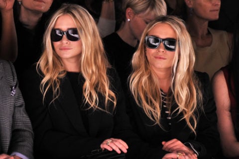 Ashley Olsen and Mary-Kate Olsen attend the J. Mendel Fall 2012 fashion show during Mercedes-Benz Fashion Week at The Theatre at Lincoln Center on February 15, 2012 in New York City wearing quiet luxury brands