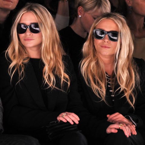 Ashley Olsen and Mary-Kate Olsen attend the J. Mendel Fall 2012 fashion show during Mercedes-Benz Fashion Week at The Theatre at Lincoln Center on February 15, 2012 in New York City wearing quiet luxury brands